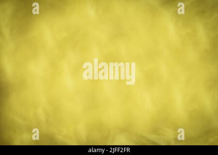 Abstraction, wall background, yellow gray paint with blur and vignetting. Backdrop Stock Photo