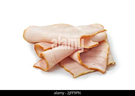 Thin smoked ham slices on white background Stock Photo