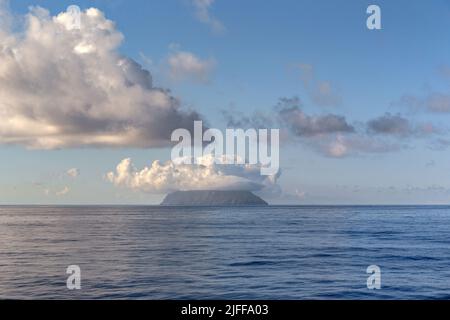 MADEIRA ARCHIPELAGO, PORTUGAL - AUGUST 26, 2021: This is a view from the Atlantic Ocean to the Desertas Islands in the early morning. Stock Photo