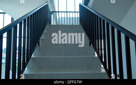 Indoor ceramic staircase. White ceramic staircase with minimalist design Stock Photo