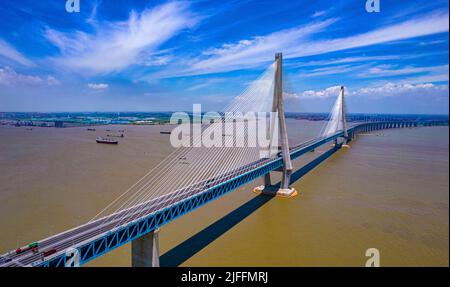 SUZHOU, CHINA - JULY 2, 2022 - A view of the Shanghai-Suzhou-Nantong Yangtze River Railway-highway Bridge on July 2, 2022. On July 1, 2020, the shangh Stock Photo