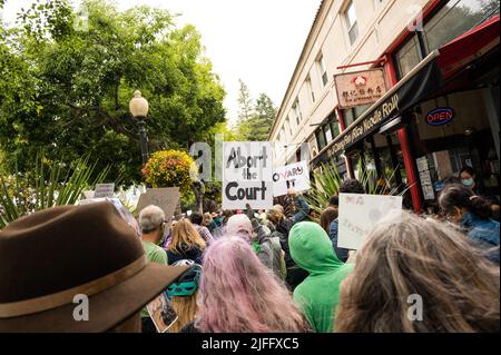 Berkeley, United States. 02nd July, 2022. Pro Choice Protesters march in downtown Berkeley holding placards during the demonstration against the Supreme Courts recent decision to overturn Roe Vs. Wade. Protesters of all ages and gender, demonstrate against the recent decision to overturn Roe vs. Wade. Speeches and chants were expressed during the 2 mile walk from downtown to the University of Berkeley. Many cars and people watching were in support of the demonstrators. Credit: SOPA Images Limited/Alamy Live News Stock Photo