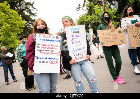 Berkeley, United States. 02nd July, 2022. Pro Choice Protesters march in downtown Berkeley holding placards during the demonstration against the Supreme Courts recent decision to overturn Roe Vs. Wade. Protesters of all ages and gender, demonstrate against the recent decision to overturn Roe vs. Wade. Speeches and chants were expressed during the 2 mile walk from downtown to the University of Berkeley. Many cars and people watching were in support of the demonstrators. Credit: SOPA Images Limited/Alamy Live News Stock Photo