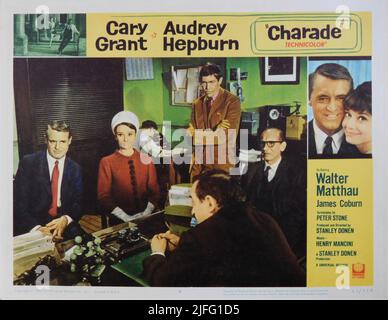 CARY GRANT AUDREY HEPBURN and JAMES COBURN in CHARADE 1963 director STANLEY DONEN story Peter Stone and Marc Behm screenplay Peter Stone music Henry Mancini Stanley Donen Films / Universal Pictures Stock Photo