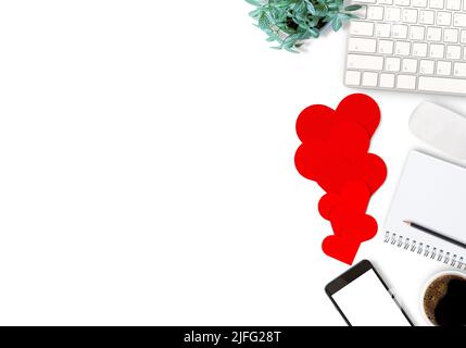 Red heart,keyboard and mouse wireless with blank notebook on white background. Top view with copy space. Stock Photo