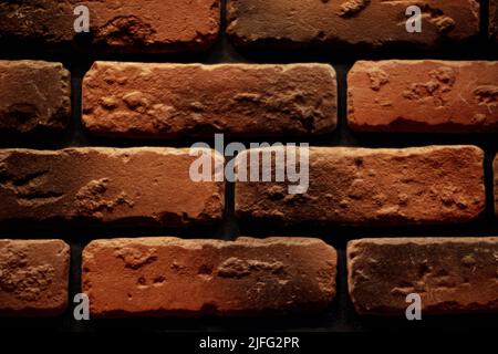 Red brick wall closeup texture background Stock Photo