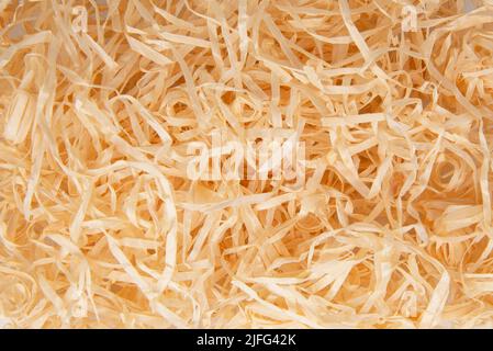 Wooden sawdust shavings natural texture background Stock Photo