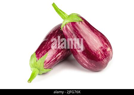 Purple eggplants. Fresh striped aubergines and eggplants with leaf isolated on white background. File contains clipping path. Stock Photo