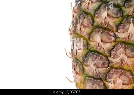 Close-up of the pineapple peel texture. Pineapple bark. Pineapple background pattern. Texture of pineapple skin isolated on white background. File con Stock Photo