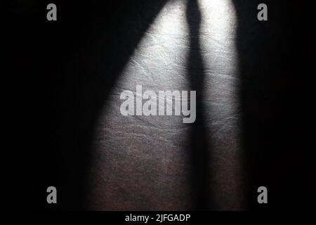 Close-up black leather texture background with shadow Stock Photo