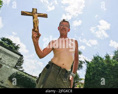 Italy, Milan province, Faithful Christian Stock Photo