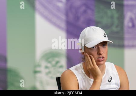 Iga Swiatek speaks to the media in the Main Interview Room following her defeat to Alize Cornet during day six of the 2022 Wimbledon Championships at the All England Lawn Tennis and Croquet Club, Wimbledon. Picture date: Saturday July 2, 2022. Stock Photo