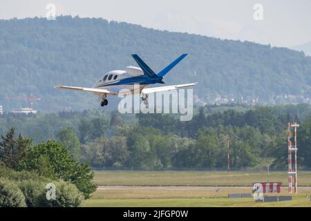 Zurich, Switzerland, May 20, 2022 Cirrus Vision SF50 aircraft is landing on runway 14 Stock Photo