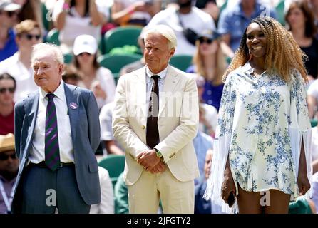 Former Wimbledon champions Rod Laver (left), Bjorn Borg (centre) and Venus Williams during day seven of the 2022 Wimbledon Championships at the All England Lawn Tennis and Croquet Club, Wimbledon. Picture date: Sunday July 3, 2022. Stock Photo