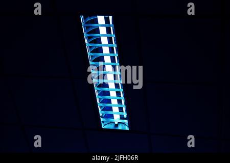 White light from Fluorescent light tube on the wall or Neon tube light.Copy space background for usage and any design. Stock Photo