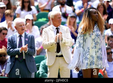 Former Wimbledon Champions Rod Laver (left), Bjorn Borg and Venus Williams on centre court during day seven of the 2022 Wimbledon Championships at the All England Lawn Tennis and Croquet Club, Wimbledon. Picture date: Sunday July 3, 2022. Stock Photo