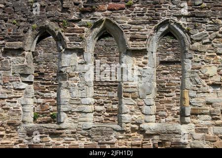 Detail of Gothic Arched Windows at Basingwerk Abbey, Greenfield Heritage Park, Wales Stock Photo