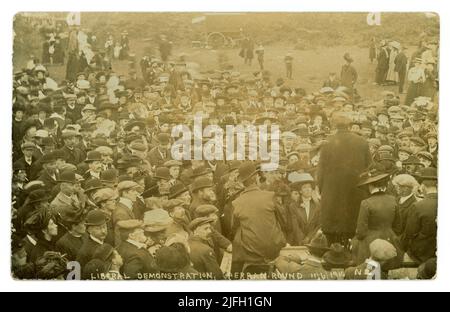 Edwardian era, Historic Cornish postcard of large crowd gathered for a Liberal Demonstration at Perran Round or St Piran's Round (a medieval amphitheatre)  near the hamlet of Rose, Perranporth, Cornwall, England, U.K.  dated 11 June 1910. Stock Photo