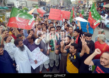 Traders and supporters of Pakistan Tehreek e Insaf (PTI) hold anti-goverment rally against price hike of petroleum and other products at Anarkali Chowk in Lahore, Pakistan, on July 2, 2022. (Photo by Rana Sajid Hussain/Pacific Press/Sipa USA) Stock Photo