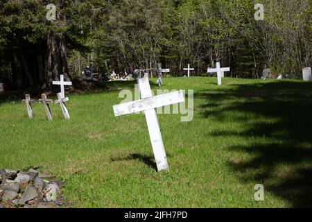 Cemetery with wooden crosses at the historic 1865 Holy Rosary Catholic Church on the Grand Portage Anishinaabe Reservation, Minnesota. Stock Photo