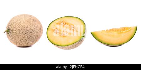 Set of yellow melon with greenish juicy pulp and slices. Honey melon with cut out piece, isolated on white background. Stock Photo