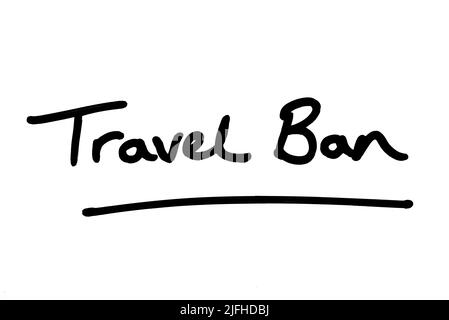 Travel Ban, handwritten on a white background. Stock Photo