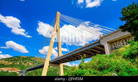 Coastal summer landscape - bottom view of The Franjo Tudman Bridge, near the port of Gruz in Dubrovnik on the Adriatic coast of Croatia Stock Photo