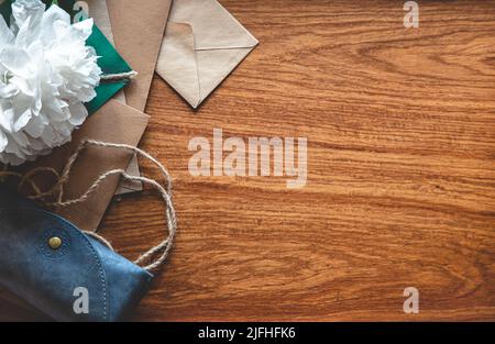 Vintage composition with envelopes on wooden background, flat lay. Stock Photo