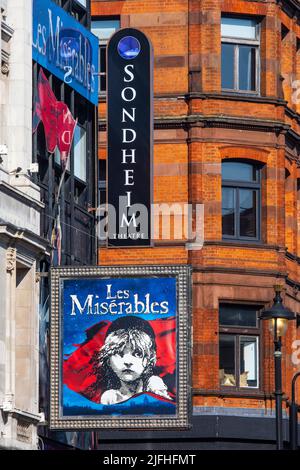 London, UK - March 8th 2022: The exterior of the Sondheim Theatre on Shaftesbury Avenue in London, UK, promoting its current musical Les Miserables. Stock Photo