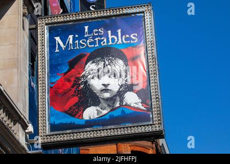 London, UK - March 8th 2022: The exterior of the Sondheim Theatre on Shaftesbury Avenue in London, UK, promoting its current musical Les Miserables. Stock Photo