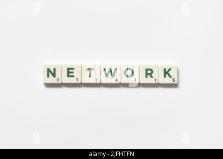 Network formed of scrabble blocks on white background. Stock Photo