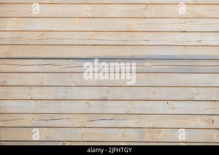 Wooden texture of lining wall paneling connected in grooves for backgrounds. Stock Photo