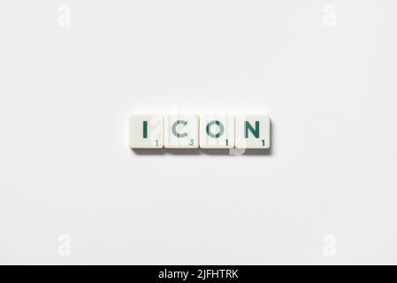Icon formed of scrabble blocks on white background. Stock Photo