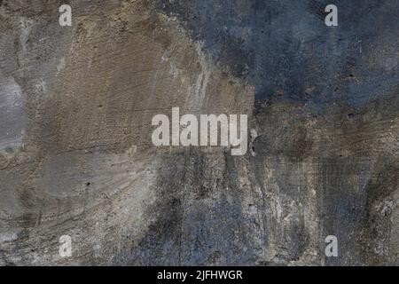 Blue, gray and gold color old cement block wall in Bali, Indonesia. Stock Photo