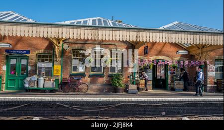 Passengers and tourist on the platform at the historic railway station at Sheringham which is part of the North Norfolk railway. Stock Photo