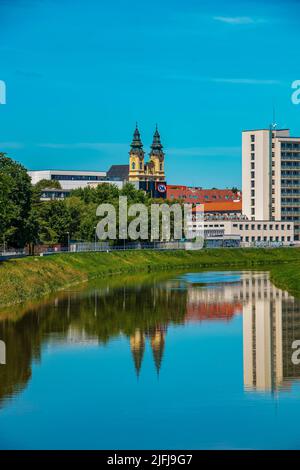Nitra, Slovakia - 06.18.2022: View of the Slovak city of Nitra. View of the Catholic castle and the Nitra river.