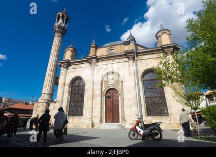 Central street of Konya with Azizie medieval Ottoman mosque, Turkey Stock Photo