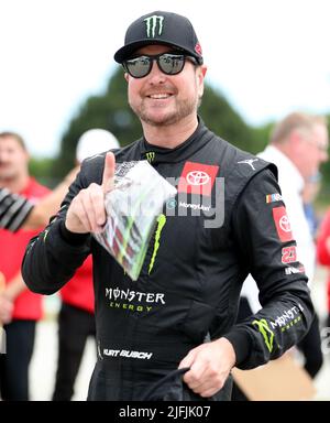 Plymouth, Wisconsin, USA. 3rd July, 2022. Kurt Busch, driver of the #45 Monster Energy Toyota, acknowledges the crowd before the NASCAR Cup Series Kwik Trip 250 at Road America on July 03, 2022 in Plymouth, Wisconsin. Ricky Bassman/Cal Sport Media/Alamy Live News
