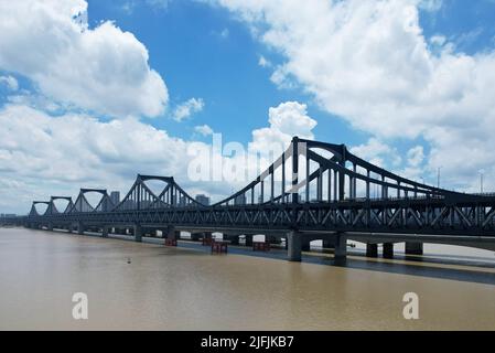 HANGZHOU, CHINA - JULY 4, 2022 - An aerial view of the newly-built Pengbu Bridge on the Qiantang River in Hangzhou, East China's Zhejiang Province, Ju Stock Photo