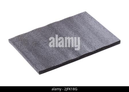 Piece of gray packaging foam rubber isolated on white Stock Photo