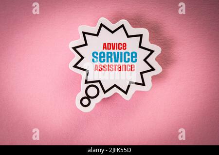 Advice Service Assistance. White speech bubble with text on a pink background. Stock Photo