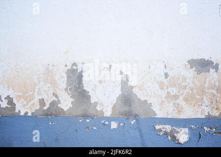 Dark Plaster Wall With Dirty White Background and old Brickwall With Peel Grey Stucco Texture. Retro Vintage Worn Wall Wallpaper. Decayed Cracked Roug Stock Photo
