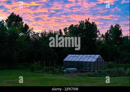 colorful clouds on summer night sky in Sweden Stock Photo