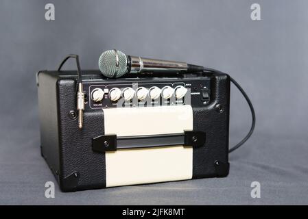 Cord jack cable to the electric guitar amplifier, combo amplifier and microphone. Stock Photo
