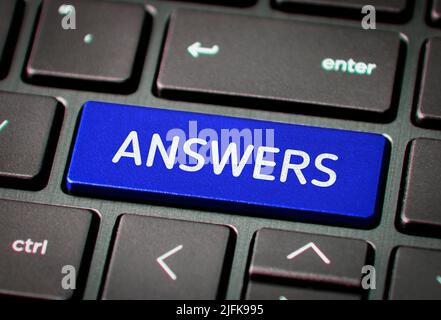 Answers word on Laptop Keyboard Key. Question and answer concept. Stock Photo