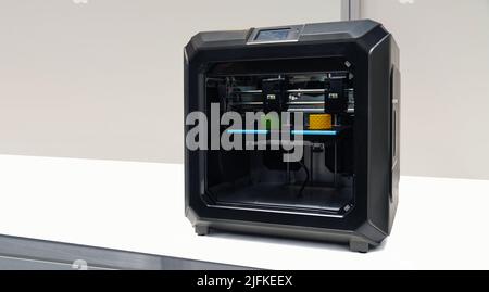 A 3d printer in the laboratory prints a structure from a polymer  Stock Photo