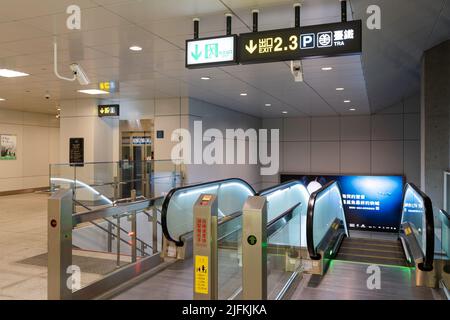 Taichung City, Taiwan - July 3, 2022 : Taichung MRT Metro system Green line Songzhu station escalator. Stock Photo