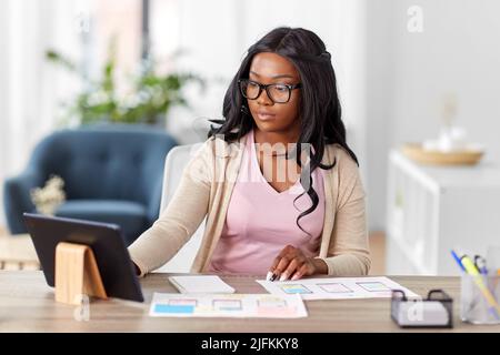 african woman working on ui design at home office Stock Photo