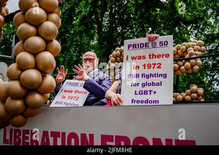Gay Liberation Front members who attended the first Pride in 1972 at Pride in London Parade, Central London, Saturday 2 July 2022 Stock Photo
