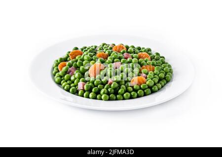 Green peas with serrano ham and carrot isolated on white background Stock Photo